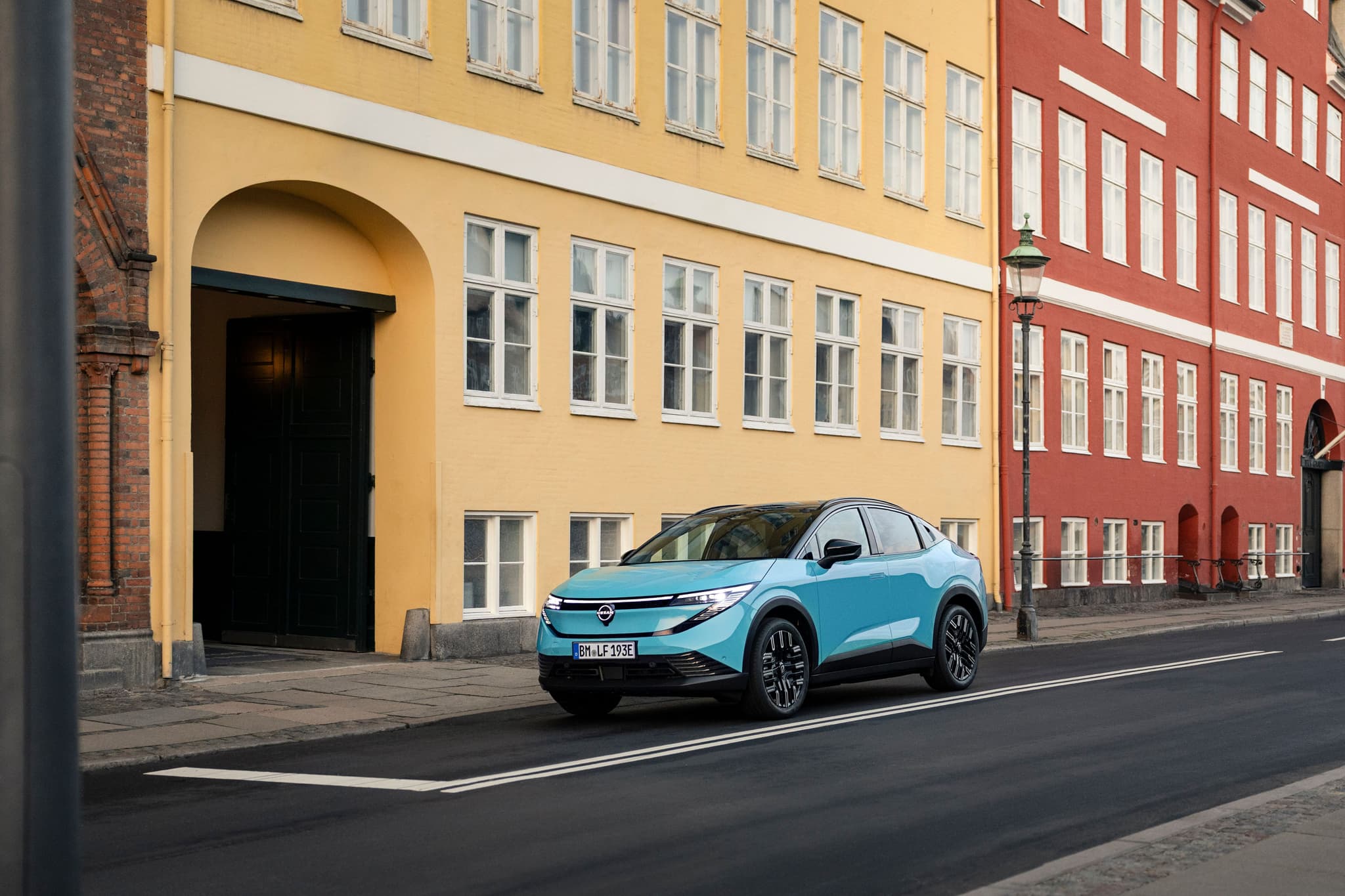 Nissan Leaf budget electric car parked in urban setting